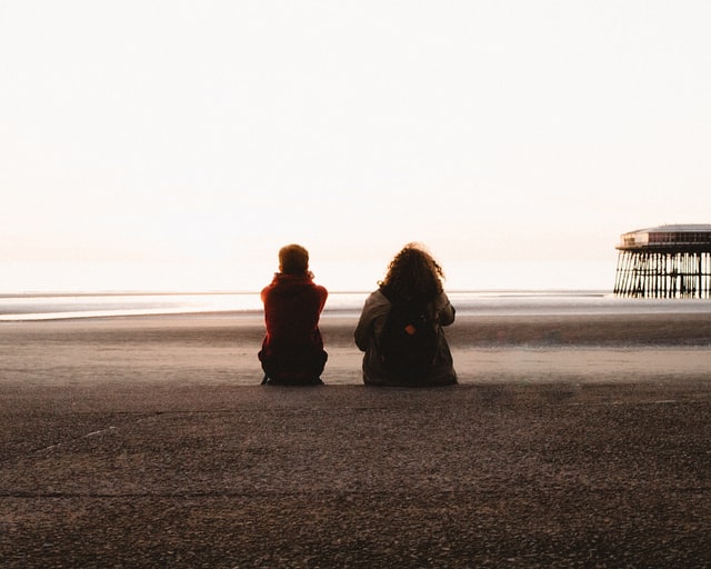 Young people sitting together